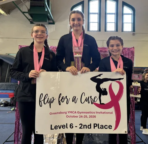 Warren YMCA Powerhouse gymnasts at their peak